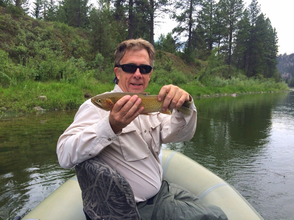 Tom Hall with a cutthroat trout on the Blackfoot River